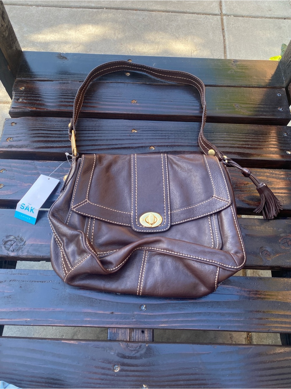 New The Sak Dark Brown Leather Shoulder Bag with Tassel Turn-Lock Gold Brown